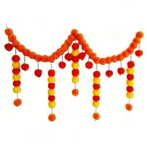 Close-up of festive orange and yellow marigold garland for Day of the Dead decoration
