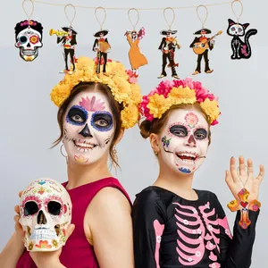 Traditional Day of the Dead wooden hanging ornaments shown in a festive party detail view.
