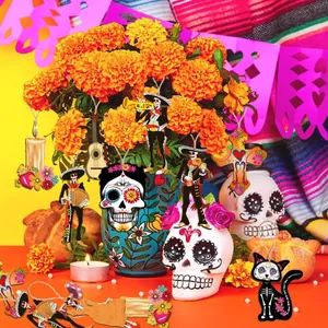 Dia de los Muertos wooden ornaments in a festive scene with marigolds and skulls.