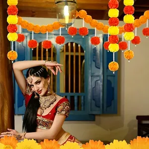 Vibrant marigold flower garlands used for traditional festival and party decor