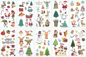 Detailed view of 10 sheets Christmas temporary tattoos with Santa and reindeer designs