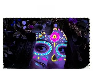 Detailed view of neon fluorescent Day of the Dead facial tattoo stickers for Halloween