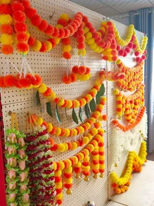 Variety of artificial marigold garlands for Indian weddings and festivals