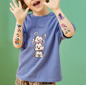 Detail view of pirate themed temporary tattoo stickers on a child model's arms