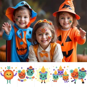 Tatouages temporaires Jour des Morts avec motifs de crânes et souci sur les enfants