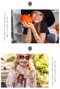 Detailed view of colorful Day of the Dead temporary tattoos on children's arms