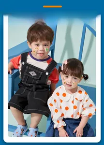 Close-up of children wearing Mexican Day of the Dead temporary face tattoo stickers