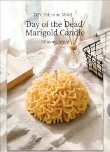 Detailed close-up view of a marigold-shaped candle made from a DIY silicone mold