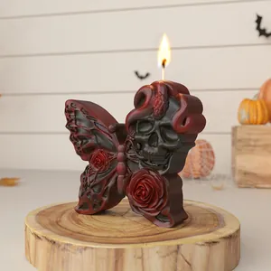Candela farfalla teschio gotico con rose per decoro di Halloween e Giorno dei Morti