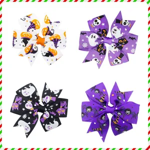 Set of four Halloween hair bow clips featuring ghost and pumpkin patterns on grosgrain ribbons