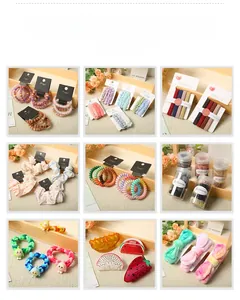 Collection of colorful children's hair accessories including scrunchies and fruit clips