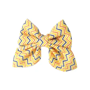 Yellow and orange chevron pattern hair bow clip for kids Halloween party