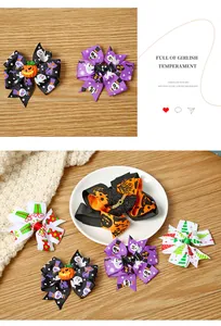 Various festive hair bows with Halloween and Christmas patterns on a wooden table