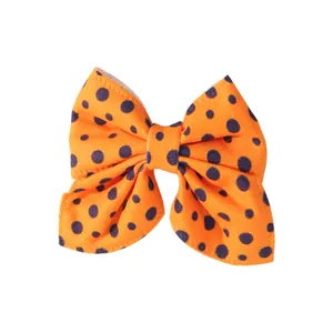 Bright orange polka dot bow hair clip for kids Halloween costume party hair accessory