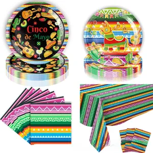 Detailed view of Mexican fiesta party supplies including paper plates, napkins, and tablecloth