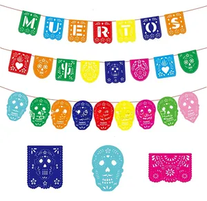 Traditional colorful Mexican Day of the Dead felt banner garland with skull and floral designs