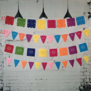 Banderines de fieltro de colores con calados para decoración del Día de los Muertos