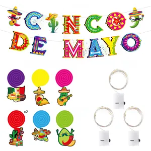 Cinco de Mayo party decoration set including banner, paper swirls, and LED string lights.