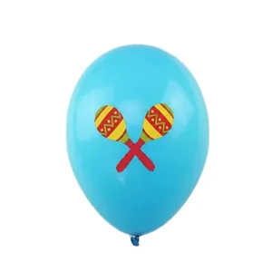 Close-up of blue latex balloon with festive Mexican maraca print for party decoration