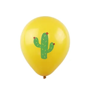Detailed view of yellow latex balloon featuring a green cactus print for Mexican party