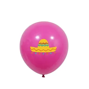 Hot pink latex balloon featuring a yellow Mexican sombrero print for festive party decor