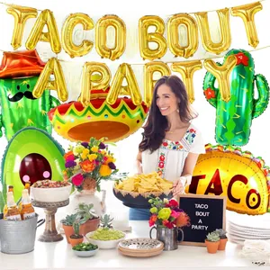 Vibrant Mexican party decoration set with Taco Bout A Party gold foil balloons and cactus