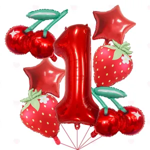 Group shot of summer fruit strawberry cherry foil balloons with red number one for party