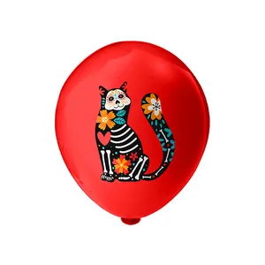 Close-up detail of traditional Mexican Day of the Dead cat design on a red 12-inch latex balloon