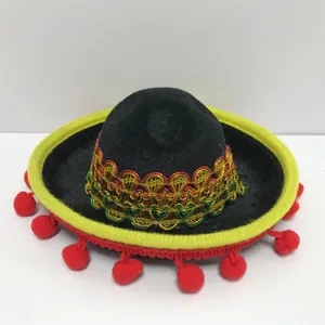 Mini Mexican sombrero with black felt, yellow brim, red pom-poms and gold embroidery details.