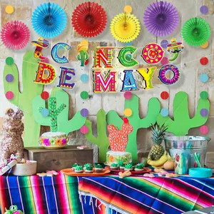 Vibrant Cinco de Mayo party decorations kit with banner and colorful paper fans.