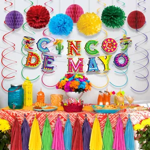 Vibrant Cinco de Mayo party decoration set featuring a colorful banner, pom-poms and tassels