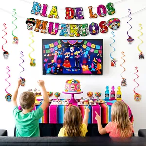 Children at a festive table decorated with colorful Day of the Dead party supplies