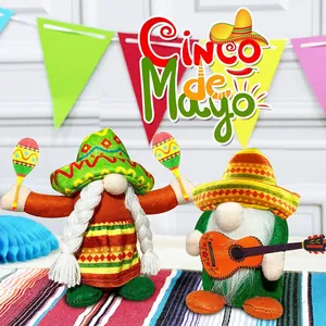 Set of two festive Mexican Cinco de Mayo gnomes with sombreros, maracas and a guitar
