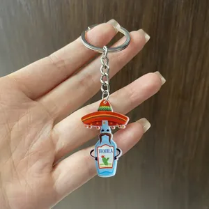 Close-up detail of a funny Mexican tequila bottle acrylic keychain for theme party