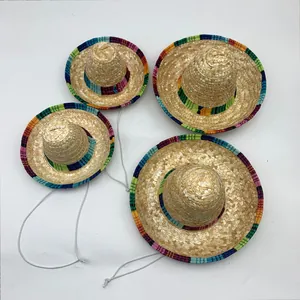 Set of Mexican straw sombreros with colorful brims for festive parties.