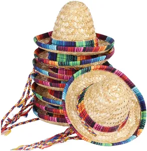 Stack of mini straw sombreros with colorful serape brims for Mexican fiesta party decorations.