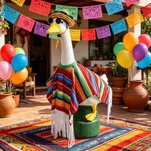 Mexican carnival costume set with poncho and hat on a decorative porch goose statue