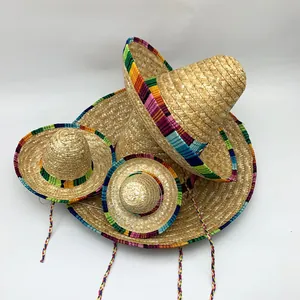 Detailed view of Mexican straw sombreros in various sizes with colorful trims