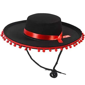 Traditional black Mexican sombrero hat with red ribbon and pom-poms for carnival party
