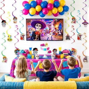 Festive Day of the Dead party scene with colorful balloons, swirls, and table decor