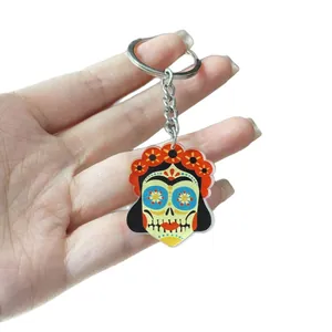 Colorful Mexican Day of the Dead skull keychain with an artistic acrylic skull pendant charm