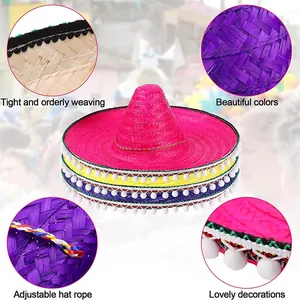 Detalle cercano de sombrero mexicano de paja con pompones coloridos y cuerda ajustable