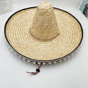 Sombrero de paja tradicional mexicano con pompones blancos y barboquejo ajustable