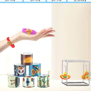 Diverse Mexican fiesta party favors including silicone bracelets and keychains set.