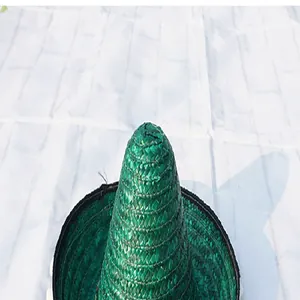 Detailed macro view of the green woven texture on a traditional Mexican straw party hat
