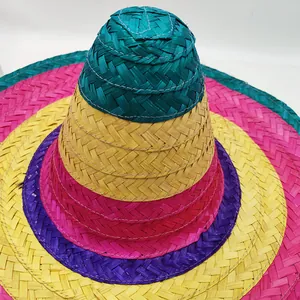 Macro view of colorful Mexican woven straw hat showing detailed texture for party props