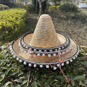 Traditioneller mexikanischer Strohhut mit Bommelbesatz für Karneval und Kostümpartys