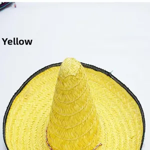 Detailed macro view of yellow Mexican straw sombrero hat with a black woven brim