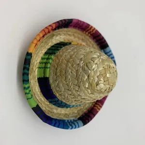 Miniature Mexican straw hat for pets with colorful fabric trim for carnival party
