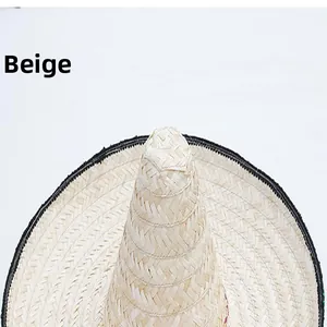 Detailed view of the woven texture on a beige Mexican straw party hat